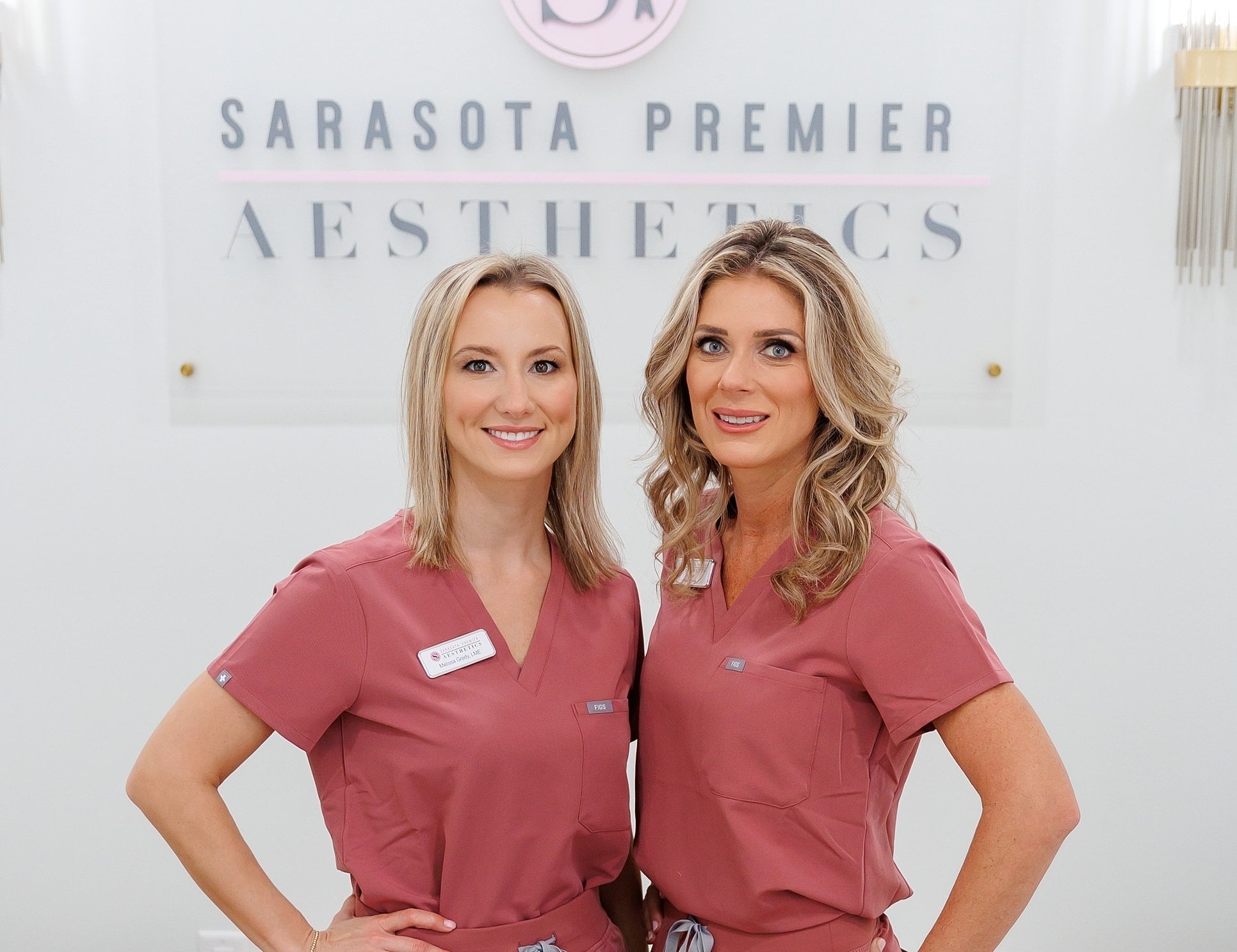 Woman with long hair posing in natural light.